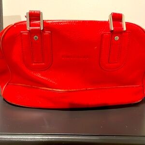 Gorgeous Longchamp red leather lined bag. Excellent condition. Statement piece.